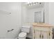 Powder room features a decorative vanity, large mirror, and classic design at 283 Grand Olympia Dr, Henderson, NV 89012