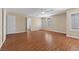 Bedroom with wood flooring, ceiling fan, and bright windows at 283 Grand Olympia Dr, Henderson, NV 89012