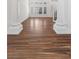 Spacious living room with wood-look floors and columns at 283 Grand Olympia Dr, Henderson, NV 89012