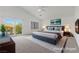 Staged main bedroom featuring a balcony at 283 Grand Olympia Dr, Henderson, NV 89012