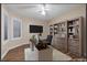 This office features custom built-ins, a modern desk, and bright natural light at 283 Grand Olympia Dr, Henderson, NV 89012