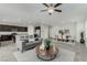 Living area featuring open concept with a view into the kitchen and dining area at 4512 Moon Hill Rock Ave, North Las Vegas, NV 89084