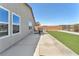 Spacious backyard with lush turf and outdoor seating, perfect for outdoor gatherings and relaxation at 456 Desoto Falls St, Indian Springs, NV 89018