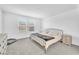 Bright bedroom features neutral decor, carpet, and window bringing in lots of light at 456 Desoto Falls St, Indian Springs, NV 89018