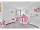 Bright bedroom features a charming ' play tent and neutral decor, perfect for a growing Gathering at 456 Desoto Falls St, Indian Springs, NV 89018