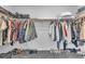 Walk-in closet equipped with ample storage for clothes, shoes, and accessories at 456 Desoto Falls St, Indian Springs, NV 89018