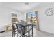 Cozy dining area with access to the backyard, ideal for indoor-outdoor living at 456 Desoto Falls St, Indian Springs, NV 89018