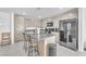 Modern kitchen with stainless steel appliances, granite counters, and an island with seating at 456 Desoto Falls St, Indian Springs, NV 89018