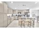Beautiful kitchen with granite countertops, stainless steel appliances, and a breakfast bar at 456 Desoto Falls St, Indian Springs, NV 89018