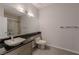 Bathroom featuring modern sink, shower, and fixtures at 4916 Mount Pleasant Ln, Las Vegas, NV 89113