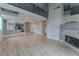 Spacious living room with fireplace and hardwood floors at 4916 Mount Pleasant Ln, Las Vegas, NV 89113