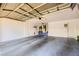 Clean three-car garage with ample space for vehicles and storage, ready for new owners at 521 Dawn Cove Dr, Henderson, NV 89052
