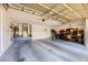 Spacious three-car garage providing ample parking and storage at 521 Dawn Cove Dr, Henderson, NV 89052