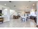 Open concept kitchen with white countertops, stainless steel appliances, and seamless flow to the living spaces at 5368 Knitmore Ct, Las Vegas, NV 89139