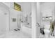 Bright bathroom with a shower, tub, and toilet at 9155 Bush Poppy Ave, Las Vegas, NV 89147