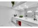 Bright bathroom featuring double sinks, large mirror and plenty of space and storage at 9155 Bush Poppy Ave, Las Vegas, NV 89147