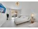 Modern bedroom with patio access, stylish decor, and marble floors at 9155 Bush Poppy Ave, Las Vegas, NV 89147