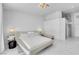 Elegant bedroom featuring a modern bed, bedside tables, and a stylish lamp, creating a relaxing retreat at 9155 Bush Poppy Ave, Las Vegas, NV 89147