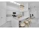 Stylish kitchen with an island, pendant lighting, and stainless steel appliances at 9155 Bush Poppy Ave, Las Vegas, NV 89147