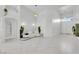 Bright living room with modern decor, sleek furniture, and stylish lighting at 9155 Bush Poppy Ave, Las Vegas, NV 89147