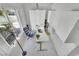 Bright home office with large windows, modern desk, and stylish decor at 9155 Bush Poppy Ave, Las Vegas, NV 89147