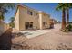 Charming home featuring an outdoor patio with a dining set and desert landscaping at 9604 Summer Cypress St, Las Vegas, NV 89123