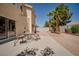 Cozy backyard with a patio area and dining set, ideal for outdoor meals and gatherings at 9604 Summer Cypress St, Las Vegas, NV 89123