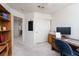 Bedroom features a desk, chair, and closet for an efficient work space at 9604 Summer Cypress St, Las Vegas, NV 89123