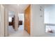 Upstairs hallway with carpet, a closet, and views into other rooms at 9604 Summer Cypress St, Las Vegas, NV 89123