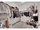 Walk-in closet offers ample storage with organized shelving and hanging rods at 10038 W Meranto Ave, Las Vegas, NV 89178