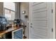 A butler's pantry area features a coffee bar and a beverage cooler at 10042 Bismuth St, Las Vegas, NV 89183