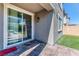 The backyard patio area is just outside a sliding glass door in this backyard at 10042 Bismuth St, Las Vegas, NV 89183