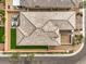 Aerial perspective showcasing a house, fenced backyard with patio set, and manicured lawn at 10250 Tree Blossom Ave, Las Vegas, NV 89166