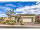 Charming single-story home with brick-paved driveway, two-car garage, and landscaped front yard at 10250 Tree Blossom Ave, Las Vegas, NV 89166