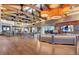 Grand lobby featuring a reception desk, wood floors, and exposed beams at 10250 Tree Blossom Ave, Las Vegas, NV 89166