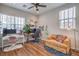 Bright office space with hardwood floors, a ceiling fan, and ample natural light at 10250 Tree Blossom Ave, Las Vegas, NV 89166