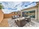 Inviting patio area with comfortable seating, ideal for outdoor entertaining and relaxation at 10250 Tree Blossom Ave, Las Vegas, NV 89166