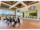 Well-lit spin studio with stationary bikes and large windows at 10250 Tree Blossom Ave, Las Vegas, NV 89166