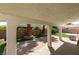 An airy backyard with brick pavers and pillars for shade at 1223 Starstone Ct, Henderson, NV 89014
