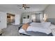 Large main bedroom with an adjacent staircase and barn-door access to the main bathroom at 1223 Starstone Ct, Henderson, NV 89014