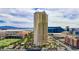 High-rise building highlighting a pool and patio area surrounded by beautiful views of the city and mountains at 135 E Harmon Ave # 804, Las Vegas, NV 89109