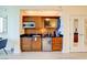 Modern kitchenette featuring a sleek microwave, sink, and a mini-fridge for convenient in-room refreshments at 135 E Harmon Ave # 804, Las Vegas, NV 89109
