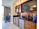 Well-appointed kitchenette featuring modern appliances, sleek countertops, and a stunning city view for ultimate convenience at 135 E Harmon Ave # 804, Las Vegas, NV 89109