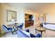 Well-designed living space featuring a table with chairs, a convenient kitchenette, and a view of the bedroom at 135 E Harmon Ave # 804, Las Vegas, NV 89109