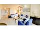 Inviting open-concept living area with a plush sofa, accent chair, and a view of the bedroom at 135 E Harmon Ave # 804, Las Vegas, NV 89109