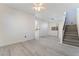 The living room features modern flooring and neutral tones at 1618 Meno Peak St, Las Vegas, NV 89115
