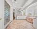 Elegant primary bathroom featuring a soaking tub, shower, and dual sinks at 1840 Myrtle Island Dr, Las Vegas, NV 89117