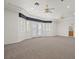 A spacious bedroom offers lots of natural light with large windows and features a ceiling fan at 1840 Myrtle Island Dr, Las Vegas, NV 89117