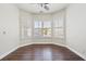 Bay window sitting area featuring hardwood floors, white trim, and natural lighting at 1840 Myrtle Island Dr, Las Vegas, NV 89117