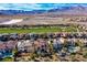 Real estate with desert landscaping, swimming pool and majestic mountain views at 1994 Orchard Mist St, Las Vegas, NV 89135